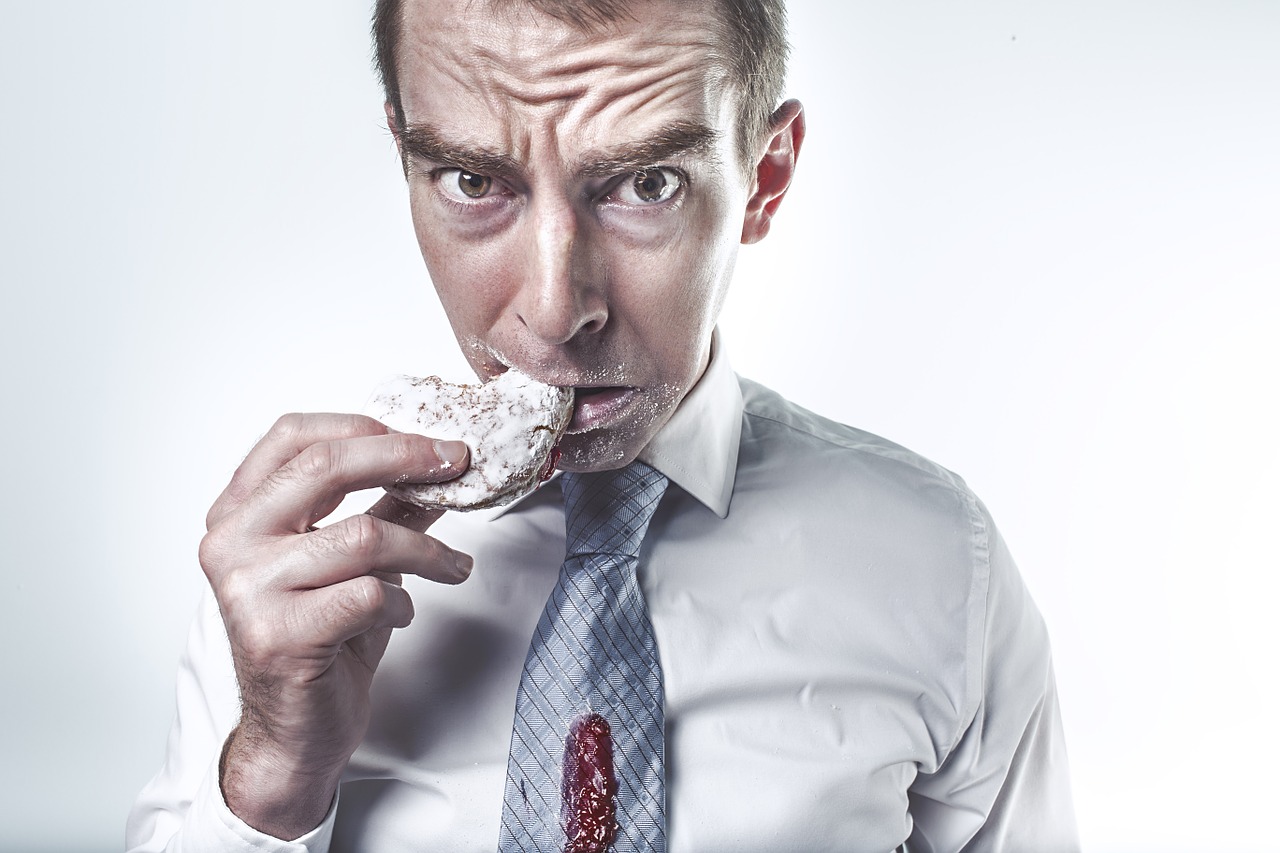 Man eating doughnut