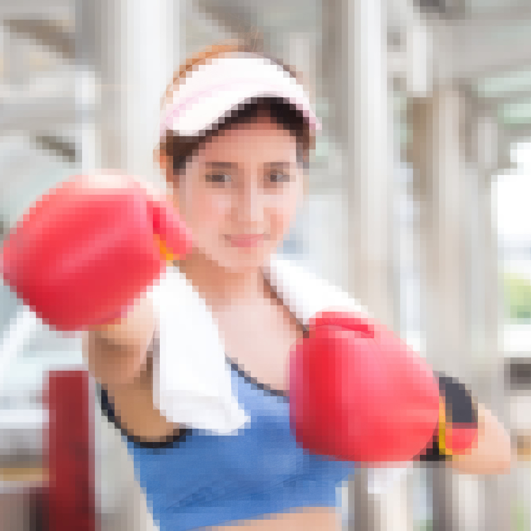 Woman with boxing gloves on