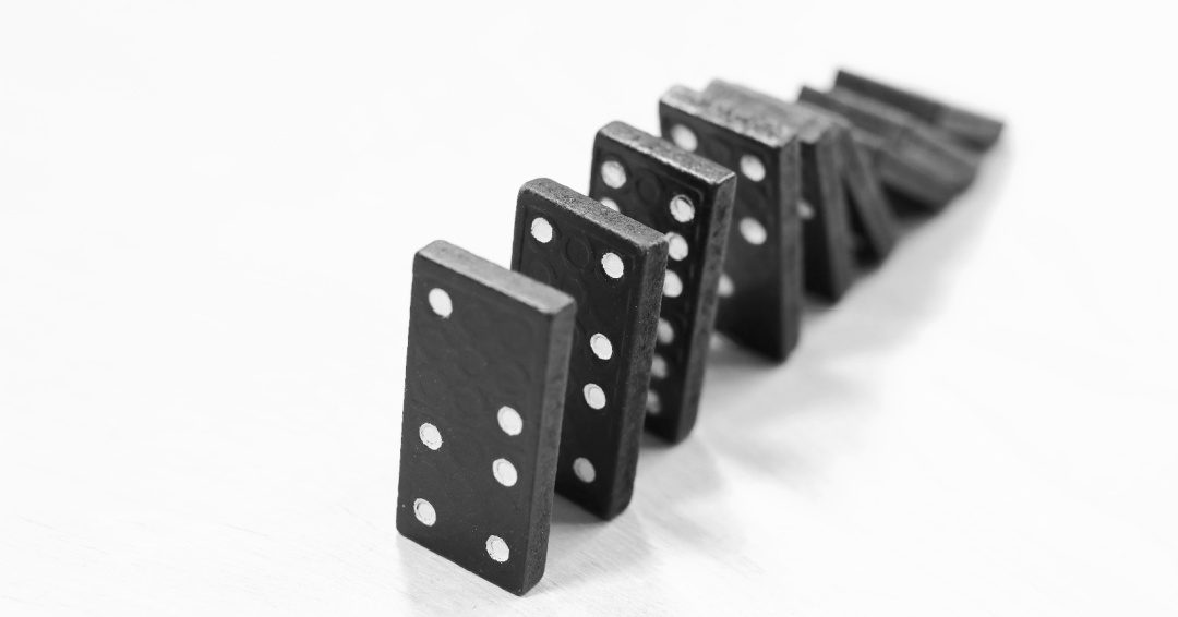 dominoes falling over