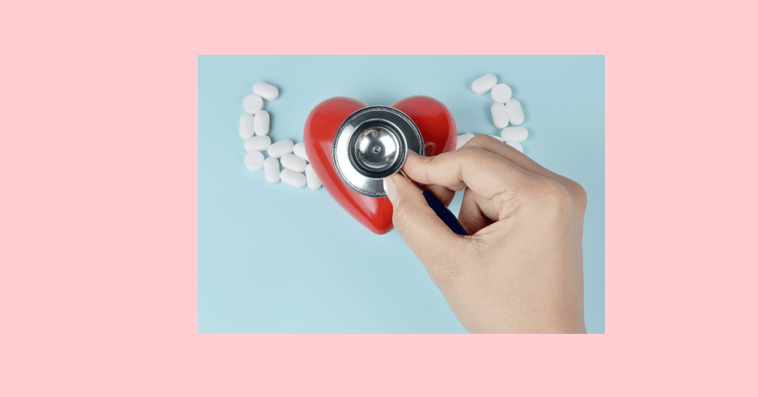 plastic heart with a stethoscope on top