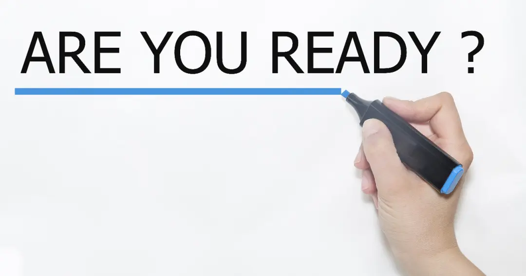 Are You Ready? Hand with Pen writing those words